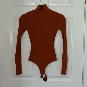 Lulu‘s long sleeve turtleneck bodysuit